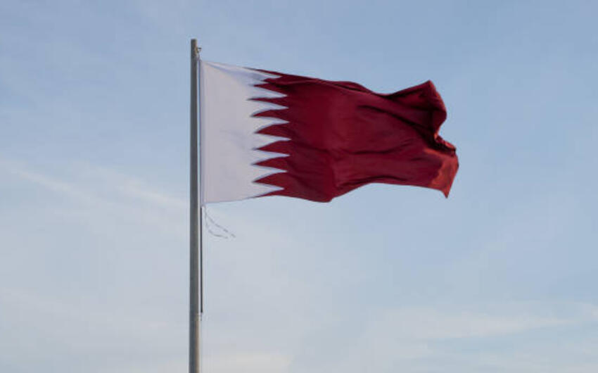 media-qatar-flag-flying-high-in-the-wind